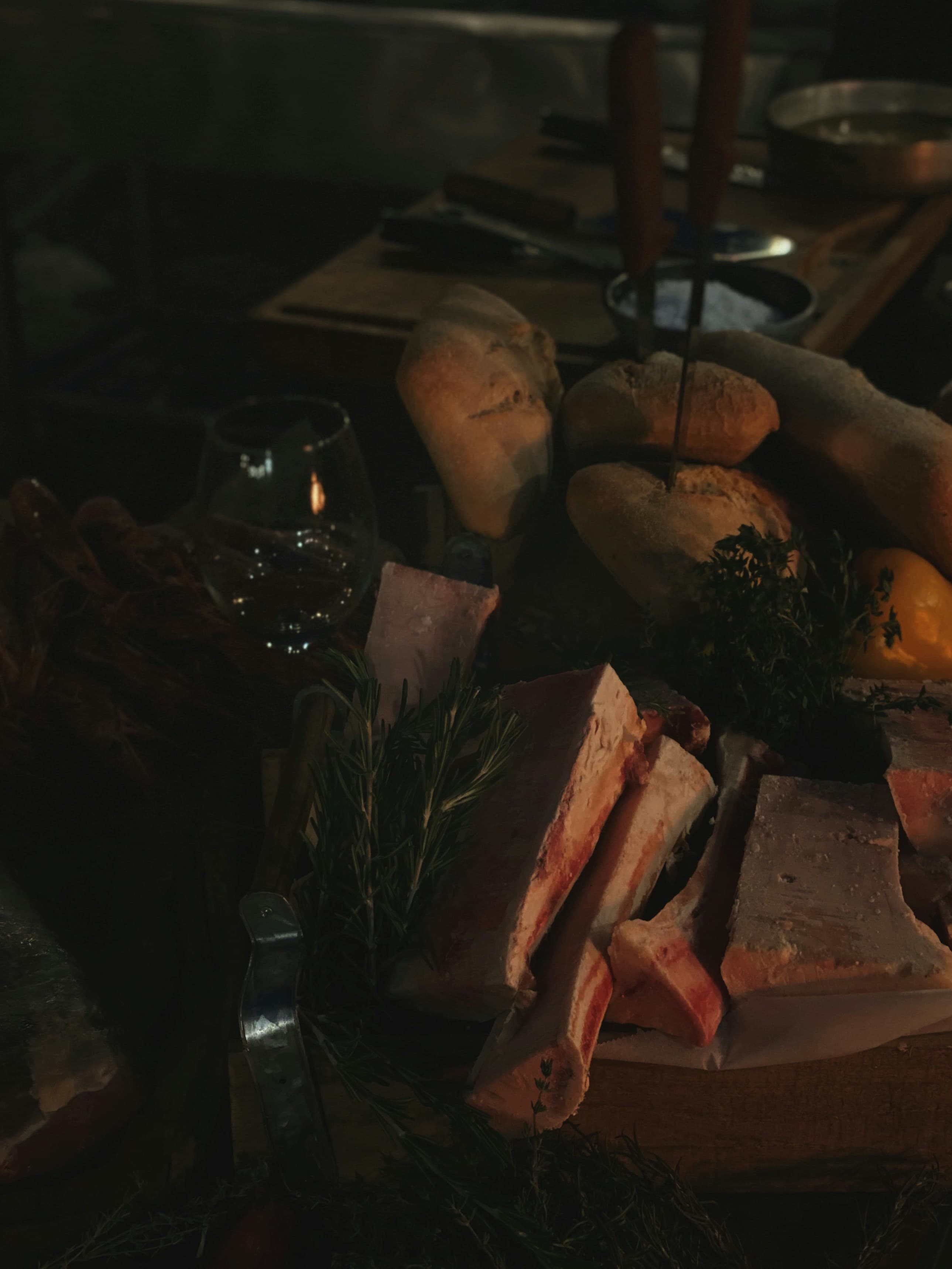 Plated tasting course on a low-lit table